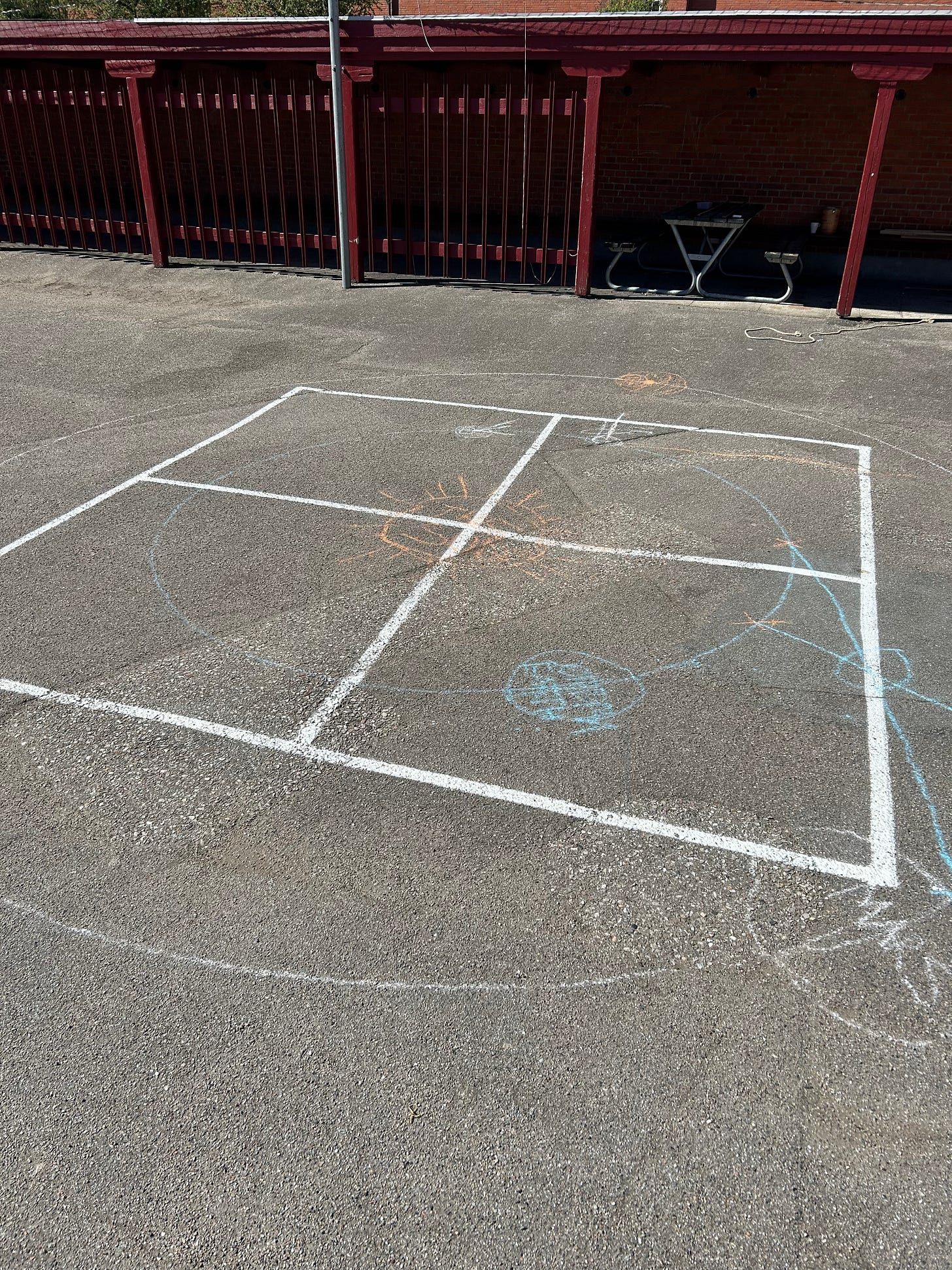 Chalk grid and planet drawings on a Danish school playground, used to recreate Tycho Brahe's measurements of Mars without telescopes